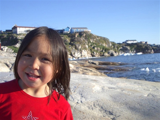 Greenlandic girl by the churchbay in Ilulissat