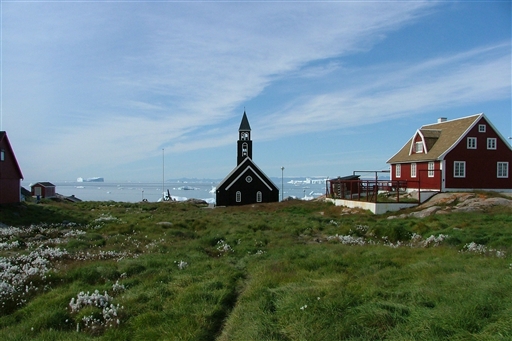 Ilulissat with the beautifull black Zion-church situated by the Disko Bay