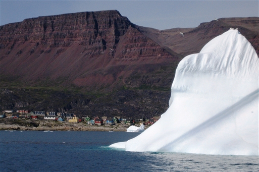 Iceberg floating by Qeqertarsuaq