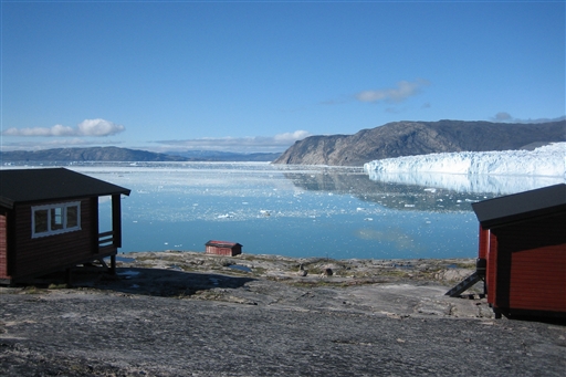 In Ice Camp Eqi we stay in comfortable red-painted wooden huts with the scenery of the Eqi glacier right in front 