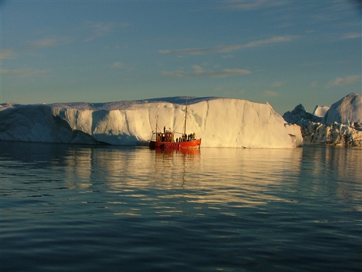Midnight sail at the mouth of the Kangia Icefiord also known as the Ilulissat Icefiord