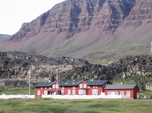The Arctic Research Station on the Disko Island surrounded by basalt mountains