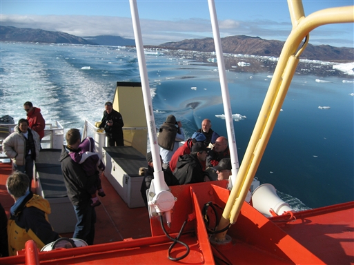 By boat through Kangia Icefiord, with view to the massive Icebergs