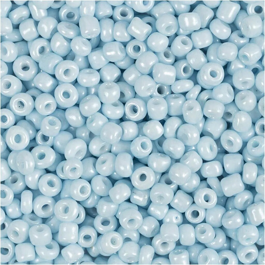 Rocaiperler diam. 3 mm str. 8/0 hulstr. 0,6-1,0 mm lys blå 25 g pr pakke