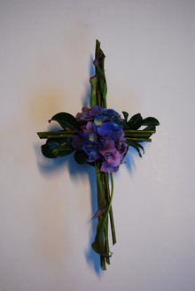 Kors med blomster.