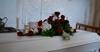 Kistepynt med røde roser