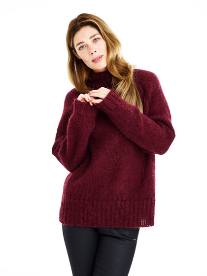 Oversize raglansweater med ribstriber