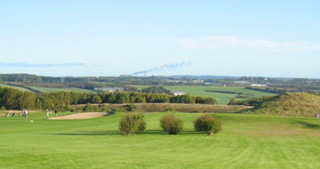 golf ørnhøj med himmel